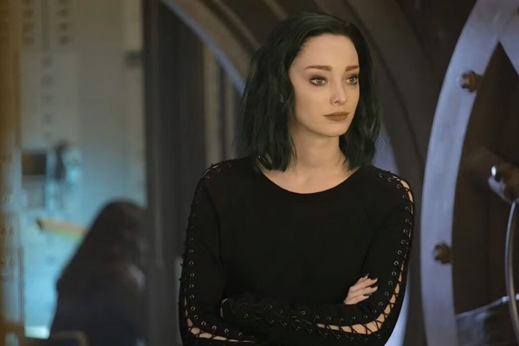 Emma Dumont as Jackie Oppenheimer