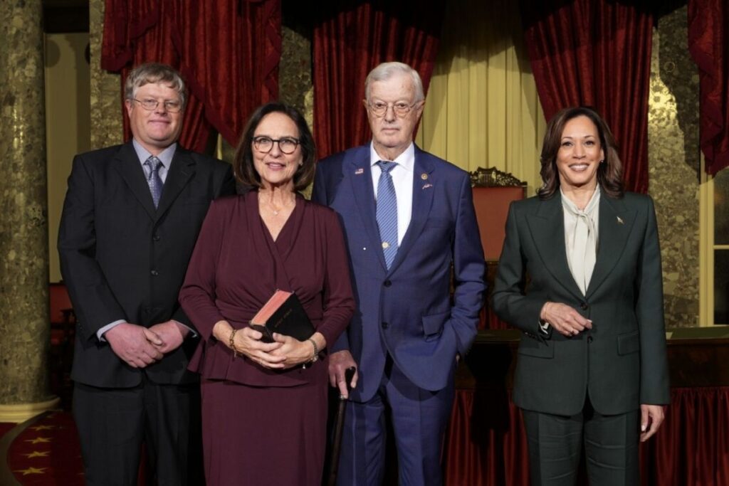 Bruce Fischer, Senator Fischer’s husband, opting not to shake hands with Vice President Kamala Harris