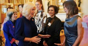 Victoria Beckham’s Asymmetric Dress for Queen Camilla Meeting